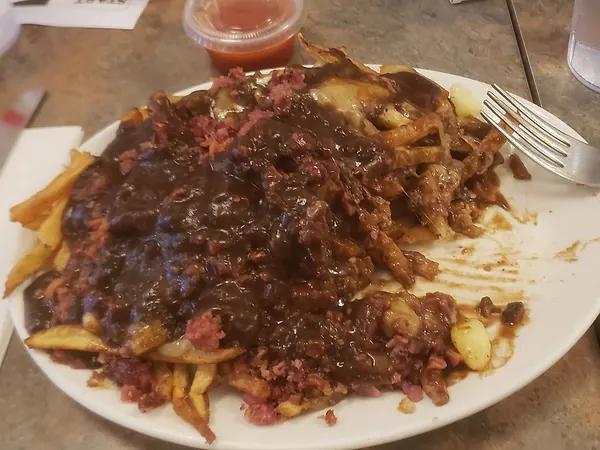 Smoked meat poutine smothered in gravy